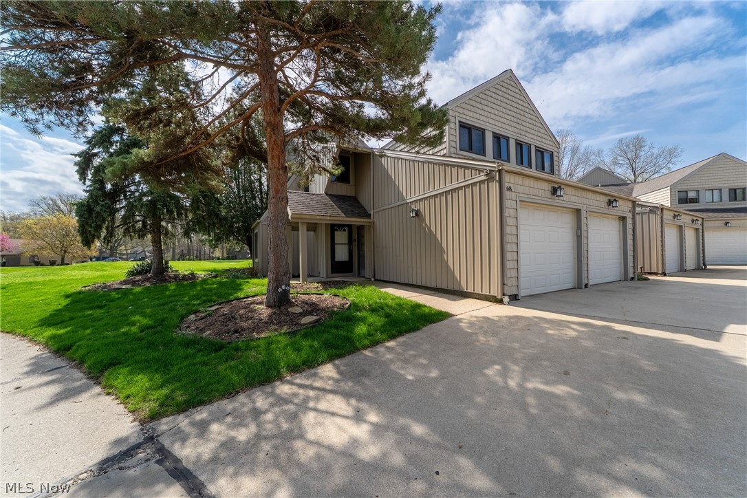 Welcome to low maintenance living in an updated 3-bedroom, 1.5 bath, true end unit townhouse!  Located in the center of beautiful Avon Lake with convenient access to the highway and shopping,  the main floor offers lots of light and an open feel with a roomy kitchen, dining and family room.  Off the family room is a large sliding glass door which leads to a private expanded patio area with updated landscaping and lots of green space!  Upstairs you will find 3 nice sized bedrooms, all with ceiling fan/lights and newer windows.  There’s a large walk-in closet connecting the master bedroom to the main bathroom which boasts brand new faucets and a dual shower head, along with a double vanity with loads of storage! The finished basement offers additional living space and a private laundry room.  There’s additional storage in the basement as well as in the second-floor attic.  All appliances and window treatments stay!  The new smart thermostat and Wi-Fi controlled garage door opener app allow you to control both from the convenience of your phone.  As part of the Landings Community, you also have access to the Landings Racquet and Swim Clubhouse (with full kitchen for use during rentals) and its well-maintained amenities which include an inground swimming pool, pickleball, tennis and basketball court, and a children's playground. Kopf's reservation walking/biking trails are only steps from this townhouse, and the lake is only a short 2-minute drive away!