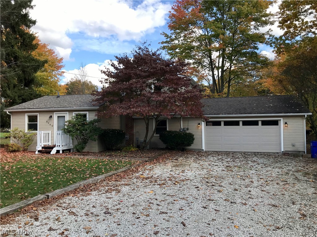 Turn-key 2-Bed Colonial  on nearly half an acre for peaceful enjoyment in Ravenna Township! Just east of city limits & near Routes 44 & 5 will provide you all the conveniences of shopping, restaurants, etc. yet close to rural areas such as West Branch State Park. You'll love the fully remodeled bathroom, Clean and Classy! Other more recent improvements include: New electric panel, 2020; Roof on house 2019/20; Garage roof 2005; Replacement windows 2016; vinyl siding 2018; Furnace 2008; water heater Sept. 2020; Gutters/downspouts/gutter guards 2018; all new interior paint and all new carpeting Sept/Oct. 2020; Garage door 2019; new door knobs/locks 2020; new light fixtures. The seller has saved you the run-around with the updating of many items! In fact, so many updates... ask your realtor for full improvements list from the MLS uploads! In the spring, the yard comes to life with Lilac, June berry, Red Bud, and Dogwood (to name a few). Nice area in back for grilling, hanging out. Nice gen