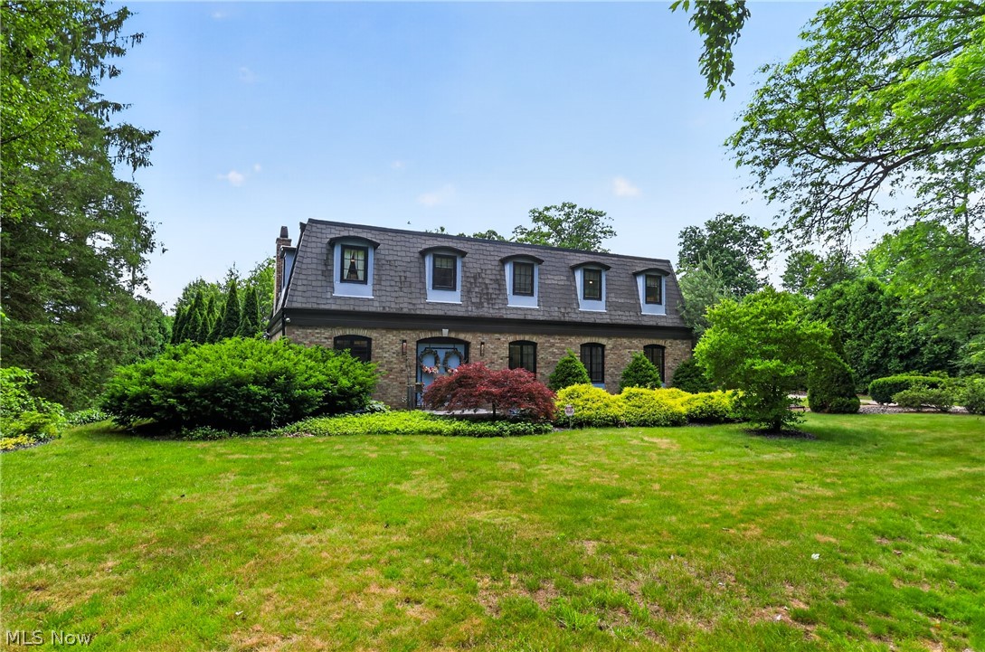 This stunning, extensively renovated home located next to Tippecanoe Country Club blends timeless character with modern upgrades throughout. Featuring an advanced security system, new electrical throughout, original Pella windows & an abundance of storage space. This home was thoughtfully designed for both comfort and functionality. The first floor has been completely reconstructed into a beautiful open-concept, with spacious living area & kitchen designed for today’s lifestyle. New paint & tile flooring that extends down the basement stairs, adds sophistication to the renovation.Elegant crown molding, base molding, new lighting & updated fixtures create a warm & inviting atmosphere. The kitchen features gorgeous granite countertops, new cabinetry & custom decorative inserts in the dining area.Two gas fireplaces add charm & comfort. A bedroom that can easily be used as a home office.Upstairs, you’ll find three generously sized bedrooms with larger closets & new doors throughout. The primary suite features a newly renovated spa-inspired bathroom complete with Italian tile, a relaxing garden tub & large open rain shower leading into an amazing walk-in closet. An additional upstairs room currently used as extra closet/storage space offers endless possibilities & could easily be converted into an upstairs laundry room. Over ¾ of the basement is newly finished & provides more living & entertaining space. The renovated bar & added inserts feature beautiful natural stone countertops. A separate playroom includes large chalkboard walls for lots of creativity. The unfinished storage areas has a toilet hookup for future bathroom addition. Sitting on one acre surrounded by natural privacy elements. Enjoy beautifully updated landscaping, new trees, new gutters & exterior lighting highlighting the beautiful features.A built to last slate roof. The large secluded patio complete with a newly built-in grill space, gas fire pit & play area near the rear is perfect for entertaining.