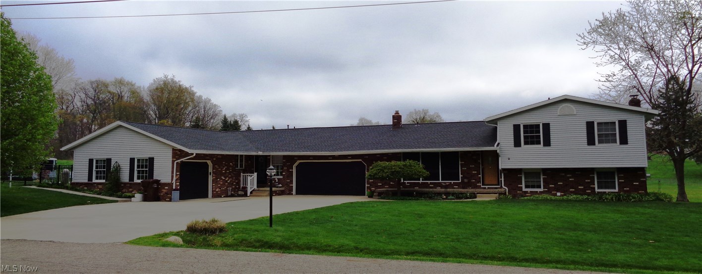 Four level split, with in-law-apartment, 4 bedroom- 2 bath home plus a 2 bedroom, 2 bath in law apartment. Split level was updated 2002- dream kit- double oven-cook top-veg sink-breakfast bar-eating area-slider to deck, FR-brick wall fireplace mass-gas logs-bookcases-French door to patio,-full bath w/dressing area-cedar closet -2 car garage w/workbench-fan-attached kennel-fenced run-approx. 1700 sq. ft.   Reverse osmosis. newer well pump, furnace, air, h/w tank, roof, windows. Laundry room with washer/dryer(Maytag enhancement), 2 storage barns, 20 x 40 in-ground pool-heated- w/nature stone- gazebo.   In law apartment built in 2002-2 bed-2 bath-LR-Kit with appl.-oak-finished basement w/chair slider-deck-1 car garage-handicap throughout-approx. 1200 sq. ft. Lot is irregular frontage 162 back 299-  America's Preferred Home Warranty on the split level only. Motivated Seller