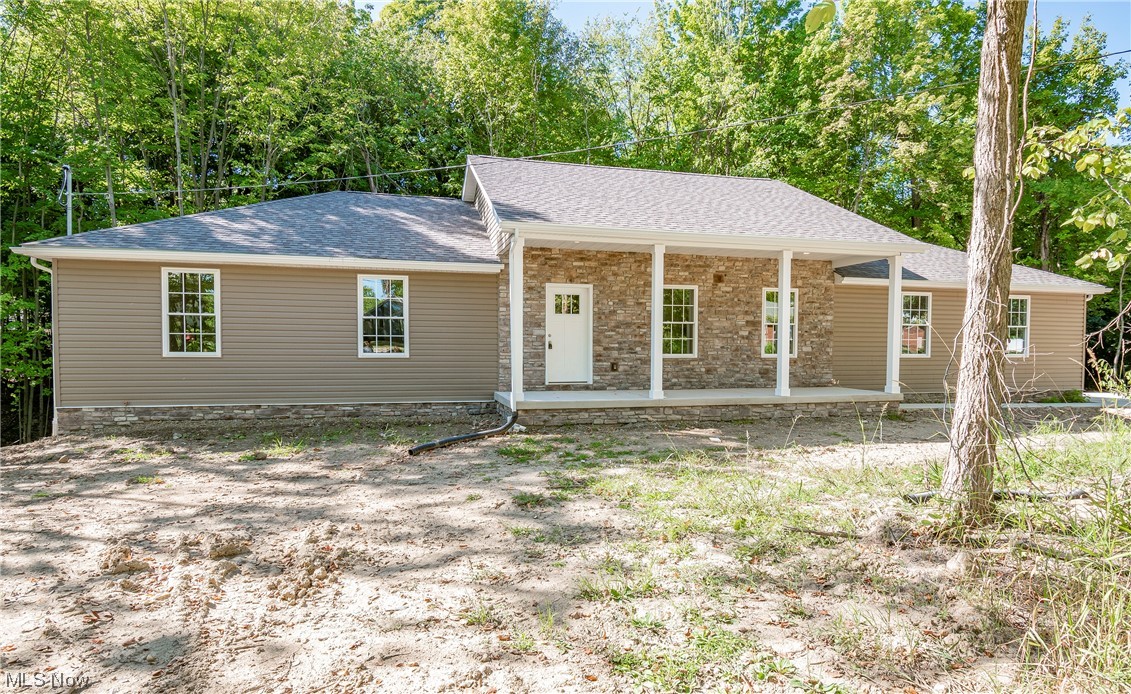Welcome home to your brand new build, 1568 Graham Road! Stunning ranch home boasting four bedrooms, three full baths, fully finished walk out basement, and more! Enter into your living room featuring vaulted ceilings, a fireplace, and large windows. Continue into the dining room overlooking your wooded backyard. Your kitchen offers access to the laundry room, walk in pantry, and spacious back deck. Luxury vinyl plank flooring throughout. Granite countertops in kitchen, bathrooms, and basement wet bar. Your large bedrooms feature double closet doors and ceiling fans. The finished walk out basement includes a fourth bedroom with attached full bath, rec room, family room, wet bar, and loads of storage space. Lot has just been professionally graded, mulched, and seeded for grass. Don't miss your opportunity to own this home. Schedule your private viewing today! Optional seller financing.