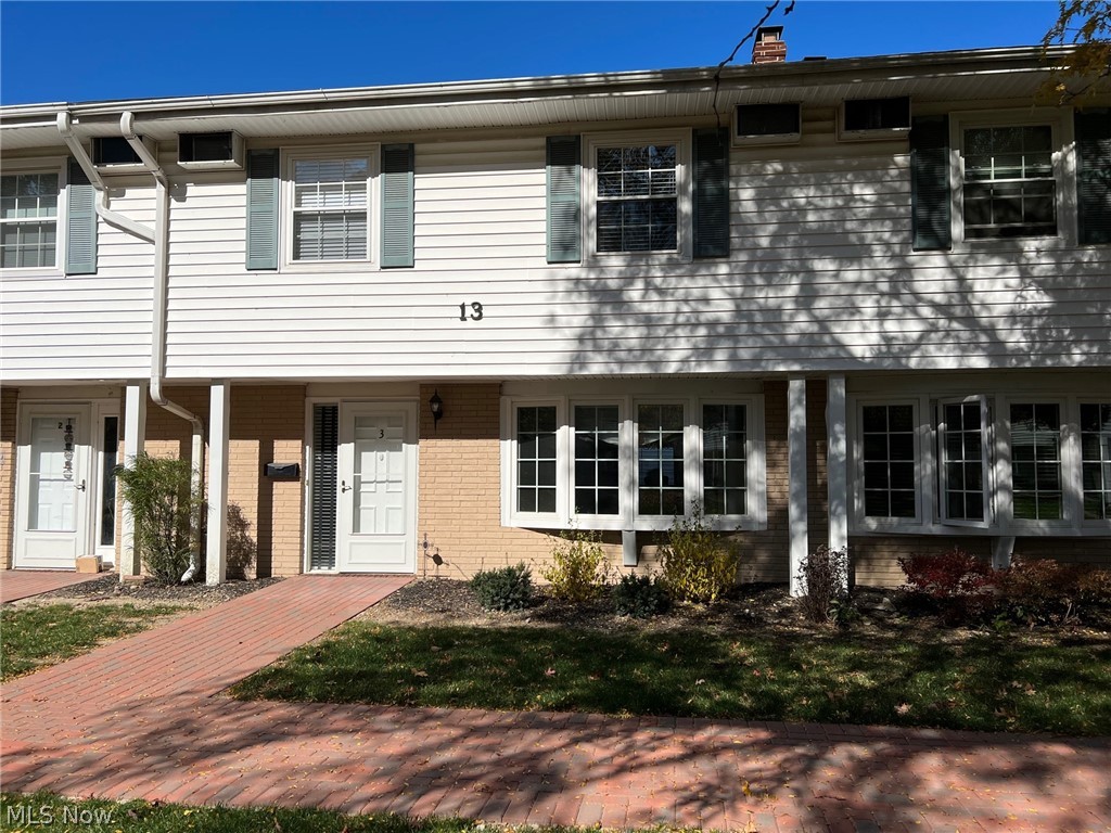 Enjoy easy living in this spacious 4 Bedroom & 2.5 Bath Meadowlawn Townhouse! This condo includes updated Kitchen & Baths and tasteful neutral decor throughout. Ceramic foyer entrance welcomes you into to Living Room with wood burning fireplace, built-in bookcases and large bay window. Dining Room open to remodeled Kitchen with newer cabinets, granite counters, tile backsplash and stainless steel appliances. Family Room with barn wood accent wall, built-in shelving, ceramic floors and slider to brick patio. 1st floor laundry/half bath. Master Bedroom & Master Bath with double sink vanity and ceramic shower. 3 additional bedrooms on 2nd floor, one is currently used as home office & 2nd remodeled full bath. So many updates since 2020 include: New vinyl windows, custom blinds and window coverings, updated electrical & lighting fixtures, all new plumbing throughout and more. 2+car attached garage. This unit overlooks the courtyard with access to swimming pool, pool house/community room, ba