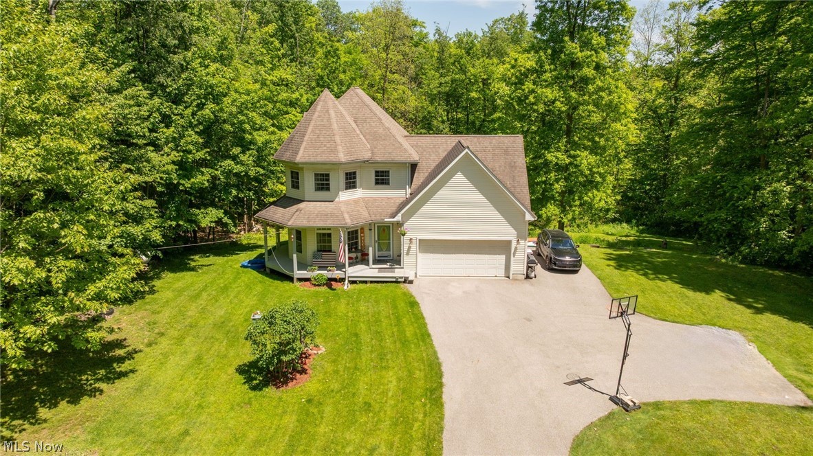 Some homes give you a place to live, others give you a space to experience peace. Tucked away on 3 private acres in the Huntsburg countryside, this beautifully maintained 3-bedroom, 2-bath home feels like exactly what you have been looking for. Surrounded by nature and thoughtfully cared for, every corner invites you to slow down and enjoy what matters most. 

Mornings begin on the welcoming front porch with the sound of birds in the distance. Evenings are best spent on the back deck overlooking the serene landscape, this is where you will watch the seasons change. Whether you are tending to your garden, enjoying a coffee from the balcony, or appreciating the warm spirit from inside, we are encouraged you will witness it as soon as you arrive.

The home is exceptionally clean, move-in ready, and filled with warmth. Complete with a 2 car-attached garage, high efficiency systems, partially finished basement and easy-to-clean floors. All appliances stay. 

A chance to truly get away without ever leaving home, you will love it.