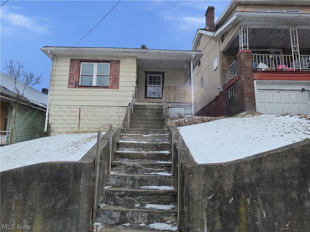 Affordable living in this two bedroom home on a full basement that is ready for your vision and updates.  It features a back porch with a wooded lot. This is a Fannie Mae Homepath property