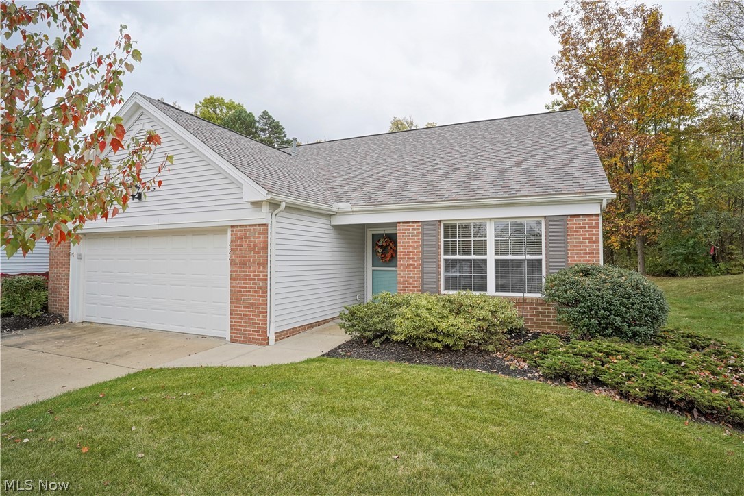 This Beautiful 1st Floor Living Home will be a joy to show and sell!  There homeowners brought this home to 2021 with cutting edge updates that include fashion neutral colors, Luxury vinyl flooring in kitchen, dining and laundry rooms, Granite countertops in Kitchen and baths, Beautiful stainless steel appliances in kitchen and high end stainless steel washer and dryer. When you walk into this end unit ranch home you are greeted with open foyer, vaulted ceilings
and a sun room off dining area. Both full baths have updates which include toilets, flooring and countertops. The two car garage has plenty of storage including the attic. Heritage Woods is a lovely, well maintained community that is literally walking distance to grocery  stores and other retail. Live in Cuyahoga Falls and enjoy its amenities & utilities that include Gorgeous Community Parks with adjacent National Parks, the newly renovated Riverfront with Pubs, Restaurants and Boutiques galore! Sellers are offering this prope