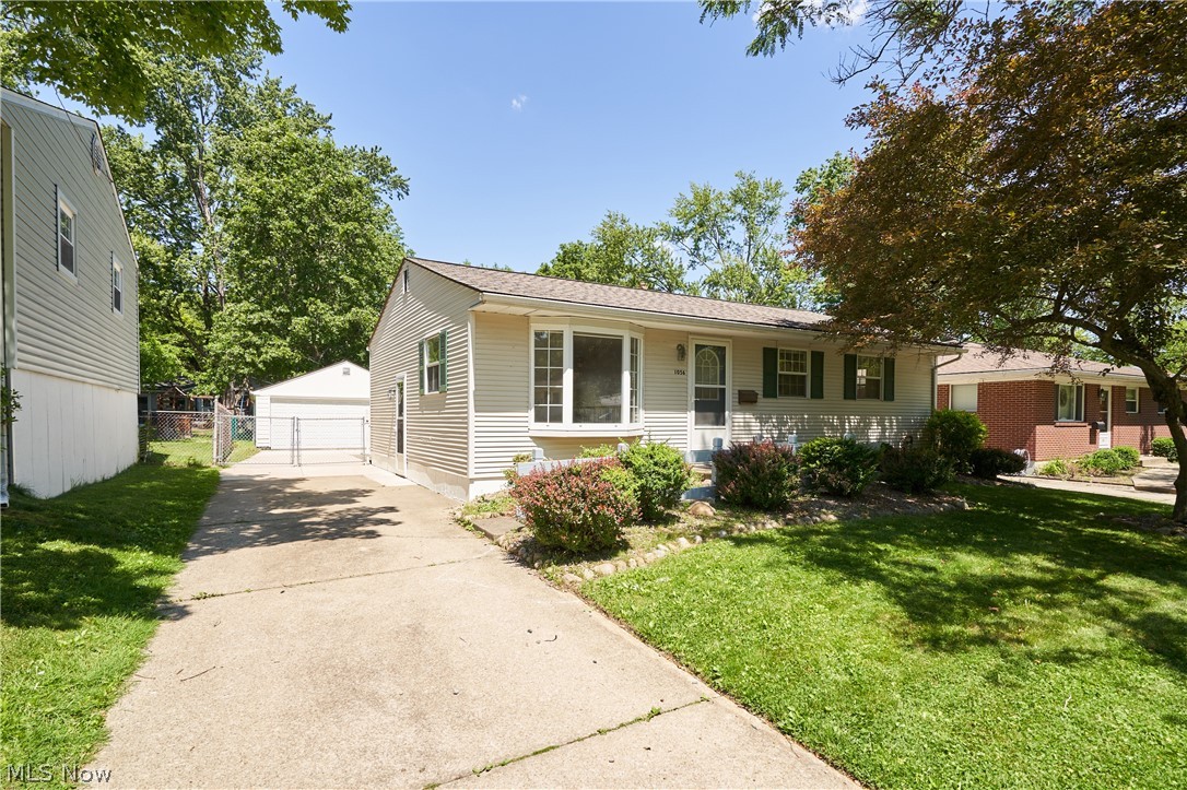 Wonderful 3 bedroom 1.5 bath ranch locate in walking distance to Sand Run Park. This is a neat and clean home with vinyl siding. Hardwood floors are in the Living Room, Dining, hall and all 3 bedrooms. The kitchen was updated with oak cabinets, stainless steel appliances and tile floor. Off the dining area is sliders that leads to a large covered deck overlooking the fenced back yard and the 2 car garage. The master has a double closet and a private half bath!  Call to see it today
