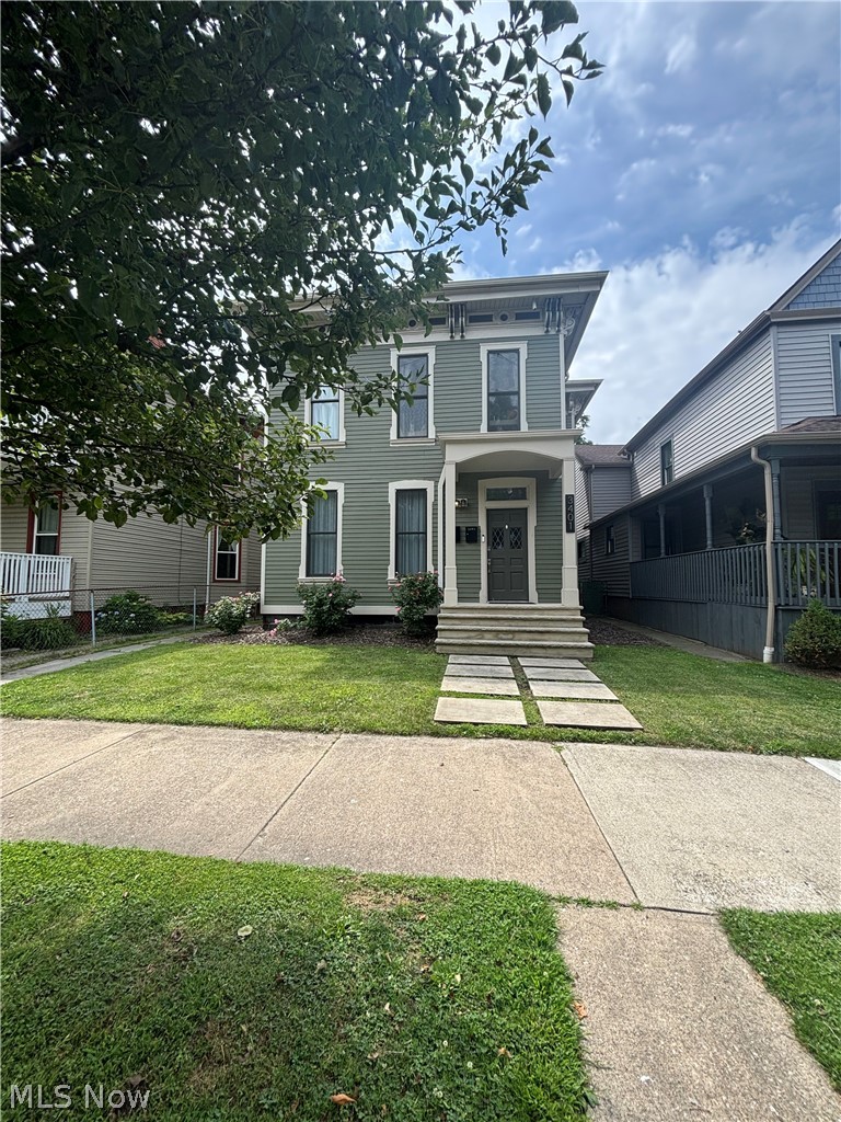 Located in the heart of Ohio City and just steps from Hingetown and West 25th Street, this exceptional duplex offers the perfect blend of historic character and modern luxury. A valuable 15-year tax abatement is already in place, enhancing its long-term investment appeal.
The home's striking exterior features a grand portico, locally sourced sandstone staircase, and a solid wood entry door accented with
beautiful leaded glass. Inside, both residences showcase soaring 10-foot ceilings, wide-plank flooring, oversized wood-framed windows, custom built-ins, and charming fireplaces that create a warm and inviting atmosphere.
Designed for both style and functionality, each gourmet kitchen features quartz countertops with breakfast bar seating, designer tile
backsplashes, and premium stainless steel appliances. The four spacious bedrooms offer high ceilings and generous closet space, while three full bathrooms provide a spa-inspired retreat with floor-to-ceiling tiled showers, natural stone-topped vanities, and upscale fixtures. An additional half bath and dedicated home office on the second level add flexibility for today's lifestyle.
Enjoy outdoor living from private walkout porches on each floor, perfect for relaxing or entertaining. The property also features all-new mechanical systems and central air conditioning for modern comfort and peace of mind.
Conveniently located just minutes from Gordon Square, Edgewater Park, and Downtown Cleveland, this turnkey property presents an
outstanding opportunity for investors seeking strong rental potential or owner-occupants looking to offset their mortgage with rental
income.
