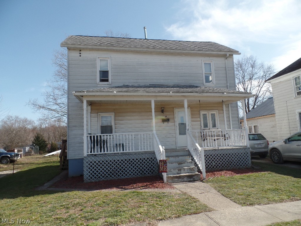 This affordable 3 bedroom home features a main floor bedroom with an additional 2 spacious bedrooms up. Vinyl replacement windows throughout and some updated LVT flooring on main floor. Spacious yard with a 2 car garage with 220 electric hookup and awaits your wood burning stove! Plus a decent sized storage building. Enough off street parking for 4-6 cars. HomeGard home warranty is in place and transfers to buyer at closing for one full year of coverage. Seller will scrape and paint front porch decking and steps before closing. Lender will most likely require flood insurance as property is in the flood plain. Seller currently pays $689.25 yearly through the National Flood Insurance program.