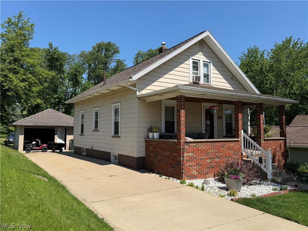 Great Homey Starter/Investment property! You will like the feel of the the eat-in kitchen with a walk-in pantry and the homey double living areas. There's a Bedroom and full Bath on the main floor, as well as 2 Bedrooms  upstairs. The full basement has a laundry area as well as 1 finished room, plus ample storage space. The home has a nice Front Porch, a Detached 1 plus car garage, some backyard space with alley access. You will like the floor plan and the solid home! Most appliances belong to the present renter-they would love to stay. Renter requests 24 hr notice to show.