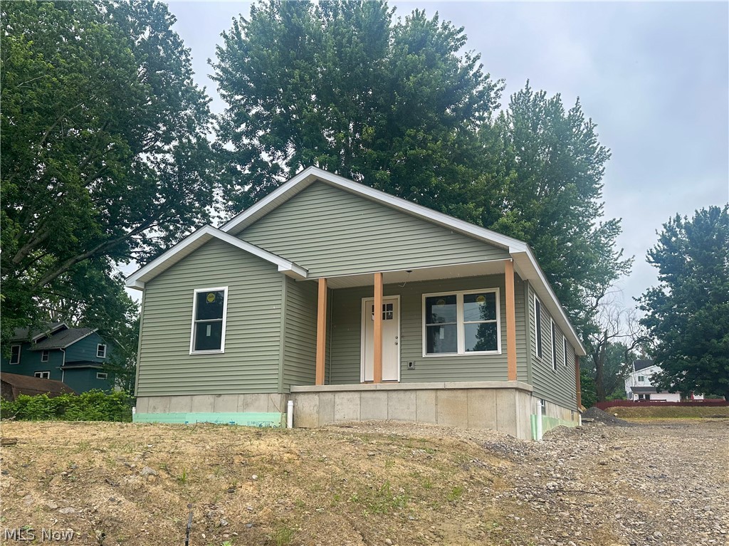 The last of four homes being built as part of the Hayward Park Redevelopment Project focused on bringing new, modern homes to individuals who meet the low-to-moderate income guidelines. Offering the perfect blend of comfort and convenience, this 3-bedroom, 2-bath ranch is currently under construction in a quiet neighborhood with easy access to shopping, dining, schools, and Lake Erie recreation. Designed with energy-saving systems to reduce monthly costs and environmental impact, this house is not only stylish but also sustainable. Step inside to find a thoughtfully designed layout featuring a spacious living room, an eat-in kitchen complete with a breakfast bar for casual dining, and a first-floor laundry room that adds to the ease of everyday living. The primary bedroom is a true retreat, offering a walk-in closet and attached full bath. Two additional bedrooms and a full bath feature ample space for loved ones and guests. The full basement provides endless possibilities for customization, while the front and back porches are the perfect spots to unwind and enjoy the outdoors. Don't miss out on the incredible opportunity to own a brand new home! Residency, income, and other guidelines apply. Inquire for information.