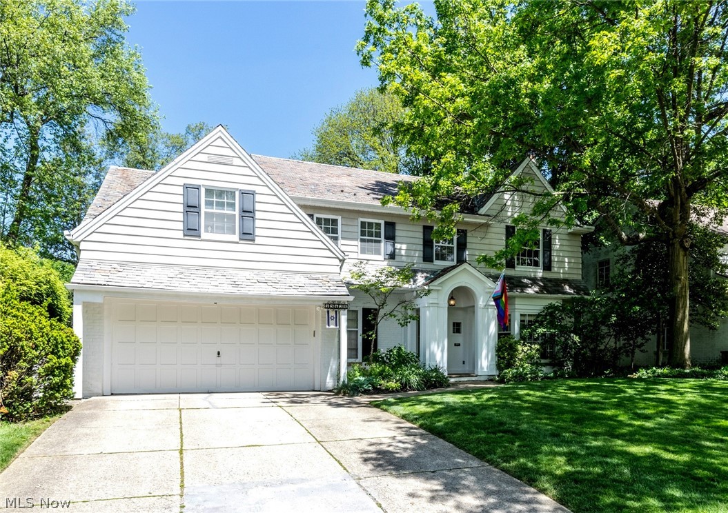 Rare opportunity in the heart of Mercer! Offering nearly 3,000 square feet above grade plus a finished lower level and bonus third floor, this classic brick Colonial combines exceptional space, a private park-like yard, and slate roof in one of Shaker’s most desirable locations! Oversized Living Room features a fireplace, crown molding, and a beautiful bay window, while the Dining Room offers classic wainscoting, chair rail detailing, and an additional bay window. Expansive eat-in kitchen with center island, abundant cabinetry, and bright Morning Room overlooks the lush, landscaped grounds; with access from Kitchen to the deck and private, park-like fenced backyard. Kitchen pantry is plumbed for washer/dryer! The cozy Family Room also opens to the back deck. Perfect for working from home, the handsome first-floor Library features rich wood-paneled walls and built-in bookcases. Staircase with wrought iron railings leads to upstairs with four spacious bedrooms and three full baths. The Primary Bedroom includes an en-suite bath with both a stall shower and soaking tub. Private Suite on second with full bath with shower over tub is ideal for guests, family, or au-pair! Staircase access leads to a huge third-floor Bonus Room (392 square feet) with hardwood flooring and a cedar closet. The lower level offers additional living and entertaining space with Nature Stone flooring, including Rec Room with a second fireplace, paneled walls, and natural daylight streaming in. Laundry, half bath and additional storage also in lower level. Slate roof regularly maintained by Owner. Some newer windows, plus newer skylight in Kitchen. Minutes to RTA Green Line for Downtown/Airport access, Walking Trail and Park, and convenient to shopping, and dining. Will be Shaker Point of Sale Compliant. This gem of a home won’t last!