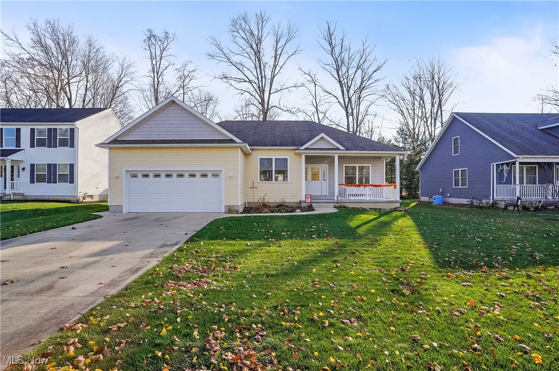 Welcome to 861 Susan Rd, Ravenna, OH 44266! This charming 3-bedroom, 2-bathroom ranch-style home offers 1,691 sqft of single-level living at its finest. Nestled in a peaceful neighborhood on a quiet cul-de-sac, this home features an inviting living room with a cozy fireplace, perfect for creating warm memories. The spacious kitchen opens to a dining area, making it ideal for hosting family gatherings. 

A full basement provides ample storage or the potential to create a personalized recreation space. The attached 2-car garage offers convenience, while the well-maintained yard provides room for outdoor relaxation and activities. 

This home has been meticulously maintained and cared for and will be a great fit for the new homeowner. With its convenient location near local amenities, this move-in-ready home is perfect for those seeking comfort and practicality.