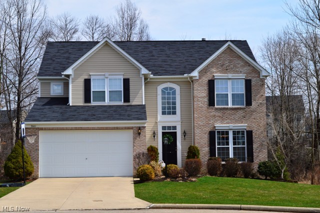 Situated on a cul de sac, this brick front colonial has been meticulously maintained and kept up-to-date with the latest styles. The Brazilian cherry wood floors flow throughout the 1st floor as well as up the stairs. The kitchen has an extra large island with a breakfast bar at one end. Enjoy the morning sun through the lightly tinted wall of windows in the morning room. Just outside is a bi-level Trex deck leading to a generous backyard and neighborhood green space. A single French door leads the way to the finished basement (approx 800 addt’l sqft) with built-in desks perfect for a home office, school work, or craft area. The master suite has its own sitting area, walk-in closet with built-in shelving, and bath with whirlpool tub, separate shower, and double vanity. The other bedrooms have plenty of closet space and share a hall bath. All appliances stay. Sump pump with back-up generator and water heater replaced in 2013.