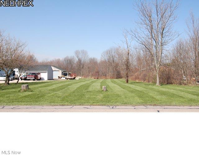 Build your dream home on this 1.98-acre vacant lot on the Columbia Township/Strongsville border. The most convenient location in Columbia Township? Gas, water and electric available at street. Sanitary sewer line installed on street October 2009 ** Realist PDF Flood map says this property is in 'Zone X - An area that is determined to be outside the 100- and 500-year floodplains.' The map is also colored to indicate that this property, and adjoining properties, are 'Out of Special Flood Hazard Area.' ** At the intersection of Marks Road & Country Meadows. Google-map 'Marks & Country Meadows 44028'