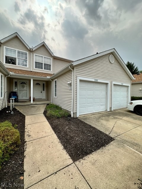 Updated townhome with new granite counters and stainless appliances.  Open floor plan on the first floor, spacious bedrooms upstairs, both with great closet space. Finished lower level with a full bath and laundry room.  One car attached garage and a private patio. Convenient location! All adult occupants must fill in a $50 online application that runs credit, criminal and eviction history plus income verification.