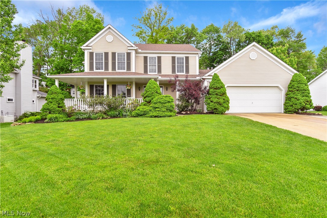 Absolutely gorgeous home located in the much-desired Tallmadge Hills. Enjoy the wrap around front porch this summer.  The entire home has been coated with fresh paint & new carpet throughout except the basement (5/18). Completely updated chef's kitchen will impress you with a grand walnut island and stainless-steel appliances including an additional wall oven, beverage fridge and two sinks.  The kitchen boasts over 50 high quality custom birch and walnut drawers/cabinets topped with rich granite. There is wonderful ceramic tile throughout the kitchen, eating area, all bathrooms and first floor laundry room. The kitchen opens to the spacious family room with cathedral ceiling and gas fireplace. There is a first floor laundry room with ample storage and formal dining living and dining rooms. Off the large master bedroom with a walk-in closet there's a brilliantly updated master bathroom (2018) with ample counter space and a beautiful floor to ceiling ceramic tile shower and standalone so