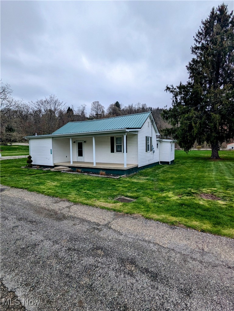 Cozy and well-kept, this 2-bedroom, 1-bath home sits on a large lot with plenty of yard space for relaxing or entertaining. Features include a spacious living area, functional kitchen, and a detached 2-car garage—perfect for parking or extra storage. Quiet location, less than a mile from a playground and ball field.