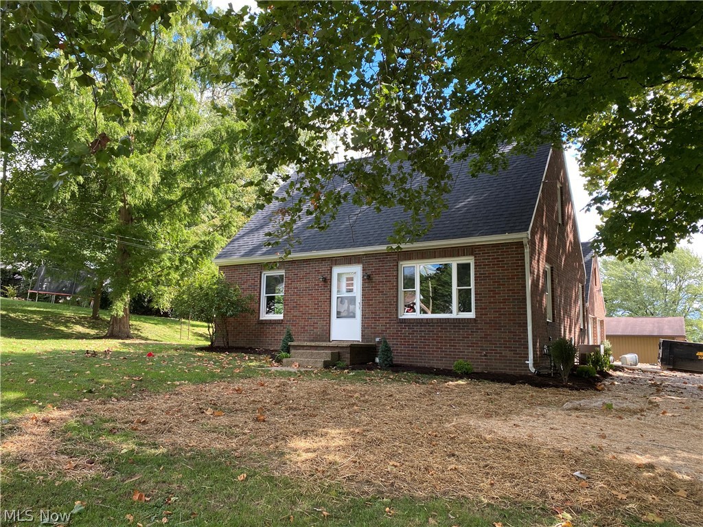 What an opportunity to buy an updated, attractive brick bungalow in a convenient location close to the elementary school in Apple Creek. The main floor has recently undergone a remodel and features a super cute kitchen with white cabinets, tile backsplash, brand-new stainless appliances, and a breakfast nook with lots of natural light. Additionally, the main floor hosts a living room, 2 bedrooms and a beautiful bathroom complete with overhead rain showerhead. Upstairs you will find an additional 2 bedrooms. The full basement adds additional storage space, utilities, and laundry. Newer vinyl windows throughout the home and the roof is approximately 4 years old. The detached, brick 2-car garage gives plenty of space for your vehicles along with a workshop area. The attic is easily accessible via stairway and gives additional storage space. Utilites to the home are NG forced air heat and central AC, electric hot water heat, public water & sewer, and water softener.