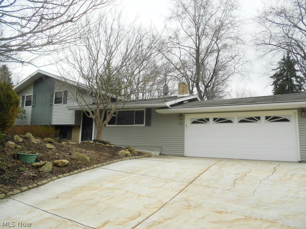 Move in condition!  This spacious 3 bedroom, 2 full bath home has been freshly painted and has new carpeting (3/2015) throughout most rooms.  The fully applianced oak kitchen offers lots of cabinet and counter space, a desk area and 2 pass throughs…1 to the dining room and 1 to the all season sun room.  A vaulted great room features built-ins and a gas fireplace; a second gas fireplace can be found in the sun room.  All bedrooms have nice closet space and there is new flooring on the upper level full bath.  Sliders and lower level walk-out lead to the private patio and beautifully landscaped backyard which features a pergola and nice shed.  The stamped concrete patio offers plenty of room for 4+ tables – perfect for grilling and entertaining this summer.  This property offers an extra large two car garage, a home warranty and updates that include:  garbage disposal and electric panel (2/2015), plus Helmet Guard gutters.