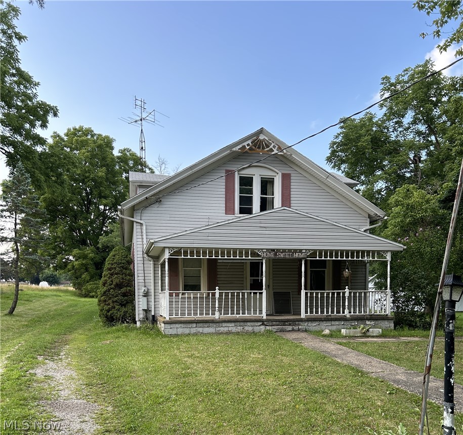 Featuring this 4 bedroom bungalow style home with living room, kitchen w/ dining area, formal dining room, 2 full baths and enclosed patio. The partial basement includes a newer gas furnace and updated electric panel box. There is also a 4 bay garage with concrete a concrete floor and electric. The house was built in 1931 with approx. 1,716 sqft of living space, well water and county sewer. The taxes are $1,007.73 per half year. This home needs some updates and repairs but is an ideal investment property!