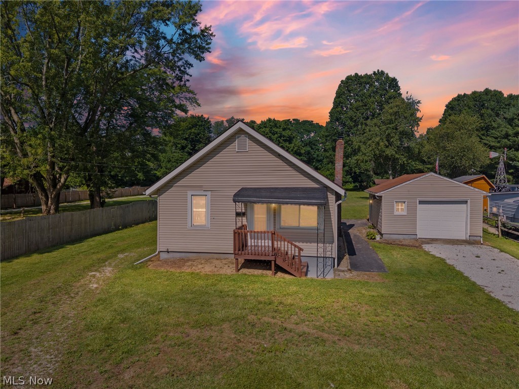 Updated home on nearly 1 acre in Copley-Fairlawn! 1218 Briggle Road offers the perfect blend of privacy, updates, and utility in a peaceful Copley Township setting. This charming 2-bedroom, 1-bath home features a bright, clean interior with an updated kitchen, refreshed bath, and a functional layout that makes efficient use of the space. The unfinished basement provides great storage and future potential, while the detached garage/outbuilding adds valuable space for parking, hobbies, equipment, or workshop use. Outside, the large lot is the true standout, offering room to relax, entertain, garden, or simply enjoy the extra privacy. Conveniently located near shopping, dining, highways, and everyday amenities, this move-in-ready home is a rare opportunity to own an updated property with land in the Copley-Fairlawn School District.