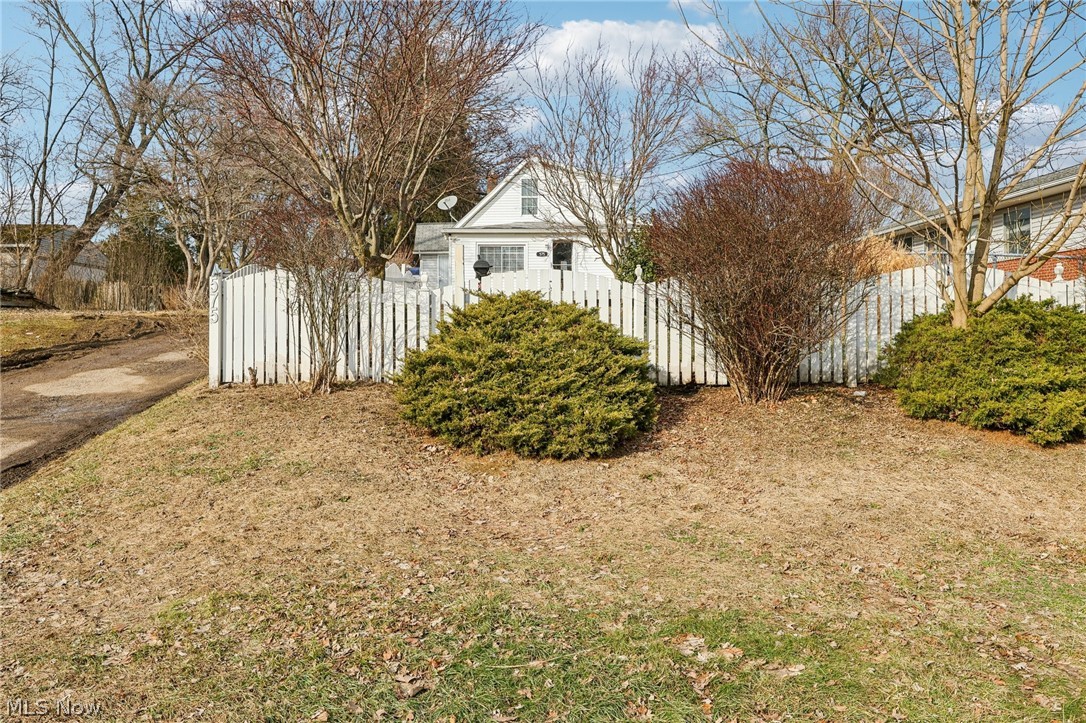 This well-maintained and beautifully renovated bungalow located in a charming Akron neighborhood can be yours. As you walk in, you'll immediately notice the beautiful flooring, spacious living room, and a cute yet functional kitchen designed for everyday living.  With two bedrooms on the main level and a large primary bedroom upstairs, there is plenty of space for family and guests. The primary suite features its own en-suite bathroom for added convenience.  The fenced-in front yard offers great curb appeal and outdoor enjoyment. The basement provides excellent additional storage, and the workshop area features higher ceilings...perfect for any handy homeowner or hobby enthusiast.  This home is an excellent opportunity for a first-time buyer or a great investment property to add to your portfolio.
