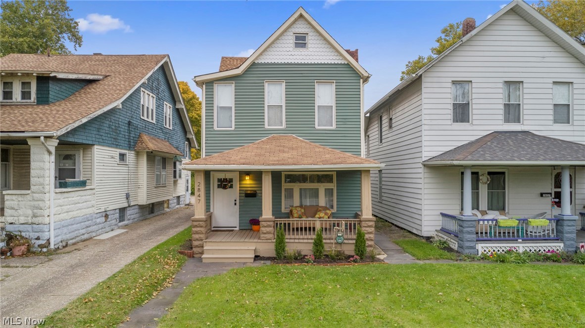 Tremont Gem!  LOCATION and curb appeal! This updated Tremont colonial offers all the old world charm of its time with today's color palette and updates. This layout flows perfectly together with the bright and airy kitchen flowing into the dining room and family room with the first-floor laundry - all for your convenience. Three bedrooms, two full & updated bathrooms and additional third-floor space offer loads of opportunity. A second-floor patio will become your favorite space to entertain or relax with coffee and a book. Oversized one car garage offers additional storage space. Just one block west of the towpath. Walking distance to Tremont dog park. Close proximity to all the restaurants, shopping, pubs, and parks of Tremont. Five minute uber to Downtown Cleveland and the Ohio City Community.