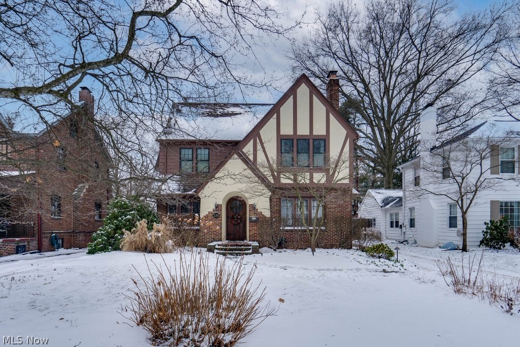 Welcome home to 336 Greenwood Avenue!  This charming 3 bedroom, 1 1/2 bath Tudor is a real must-see!  With original oak hardwood floors, high ceilings, big windows, and renovated kitchen and baths, this colonial has so much to offer!  Enjoy the natural light that flows throughout the home.  Welcome guests in the spacious dining room.  Find plenty of kitchen storage space in the updated cabinetry.  Cozy up to a warm fire with the newly relined firebox in the fireplace.  Feel the comfort of the home created by the attic blanket insulation, new upstairs AC, 2nd floor Pella windows, and new glass block windows in the basement.  Updates are many....Come and check it out!!!