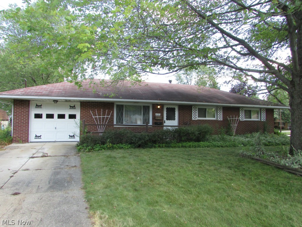 An excellent opportunity to be in Stow for $80,000.  Bring your own touches to this 3 bedroom, 2 full bath all brick ranch.  There is an attached 1 car garage.
