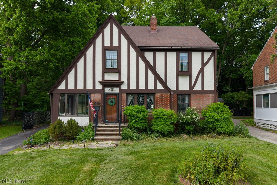 Welcome to 3605 Meadowbrook Blvd in the heart of University Heights! This character-filled Colonial offers 4 bedrooms, 1.5 baths, and over 2,000 square feet of timeless charm paired with thoughtful updates throughout. Nestled on a picturesque, tree-lined street with lush landscaping, this home blends stunning original details with modern functionality. Inside, you’ll find natural hardwood floors, abundant natural light, beautiful original paned windows and doors, and a warm, inviting atmosphere throughout. The spacious living room features a gorgeous focal fireplace and opens to a cozy bonus nook perfect for morning coffee, reading, or a plant-filled retreat.
The dining room flows seamlessly into the kitchen, offering ample cabinet storage and generous counter space. A stylish first-floor half bath features classic subway tile accents. Upstairs offers four spacious bedrooms with large windows, hardwood floors, and flexible space for guests, offices, or personal retreats. The third-floor bonus space adds even more versatility for a playroom, office, studio, or additional living area. The unfinished basement provides excellent storage, while the enclosed sunroom is a standout feature with surrounding windows and tile flooring, perfect for relaxing or entertaining year-round. Updates include central air (2018), Nest thermostat, resurfaced driveway, waterproofing and sump pump, updated lighting, refinished tub, exterior and interior painting, gutter guards, new garbage disposal, updated PVC waste stack, and more. Conveniently located near parks, shopping, dining, universities, hospitals, and highway access, this home offers the perfect blend of classic charm and everyday convenience!
