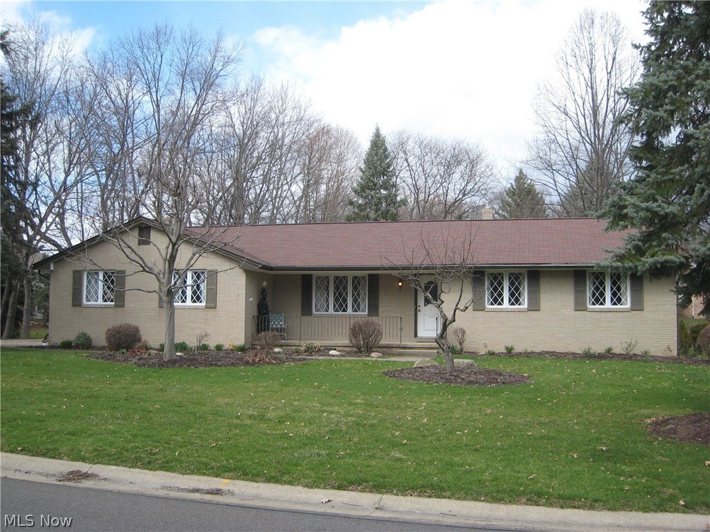 Bob-O-Link! Pristine and move in ready!  True pride of home ownership is exemplified in this brick ranch nestled on a landscaped lot. The parquet foyer entry welcomes you to the freshly painted and newly carpeted interior.  Updated kitchen includes all appliances and ceramic tile floor that extends into the spacious eating area.  French doors lead out to the private patio, picnic area and cozy trellis with a swing.  The garden is awaiting your flowers and herbs.  Perennials are thoughtfully planted throughout the landscaped beds. Step down into the family room with woodburning fireplace (gas starter). The side load garage has pull down stairs for storage, new door w/opener that enters into a small foyer off of the family room.  Full basement with glass block windows, electric panel with 200 amp service, sump pump, sealed and painted walls and painted floors. furnace 2013, central air 2006, hot water tank 2012, roof 2006.  There is blown insulation, Pella windows and patio doors, and st