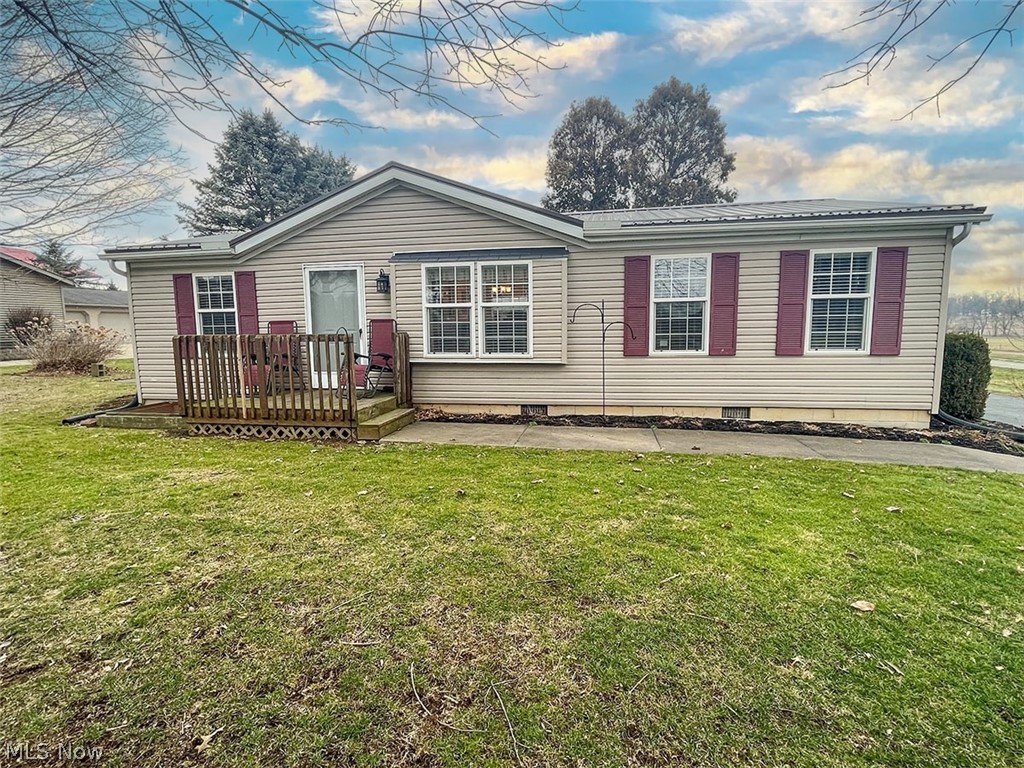 Located in the heart of Kidron, this well-maintained ranch style manufactured home features 3 bedroom + 2 full bathrooms. Open floor plan consists of living room, dining room leading to kitchen + laundry all with newer vinyl plank floors. Three bedrooms with the primary including an updated bathroom and another full bath. The utilities of the home are private well, public sewer, and full house Generac 1200 KW generator. The amenities are new hot water tank, new water boss softener system, new central air, new metal roof on the home, and new interior 6 panel doors throughout the home. Situated on a block foundation with steel H beams, pea gravel beneath, and sump pump. Included is a 24x46 Detached 3 car garage. The 24x26 area is block with 2 newer garage doors. The remodeled 24x20 area has a garage door, great for a workshop, has an upstairs attic, and fully insulated. There’s a 12x14 storage barn with block foundation (used for a summer kitchen). The property has a lot to offer and is