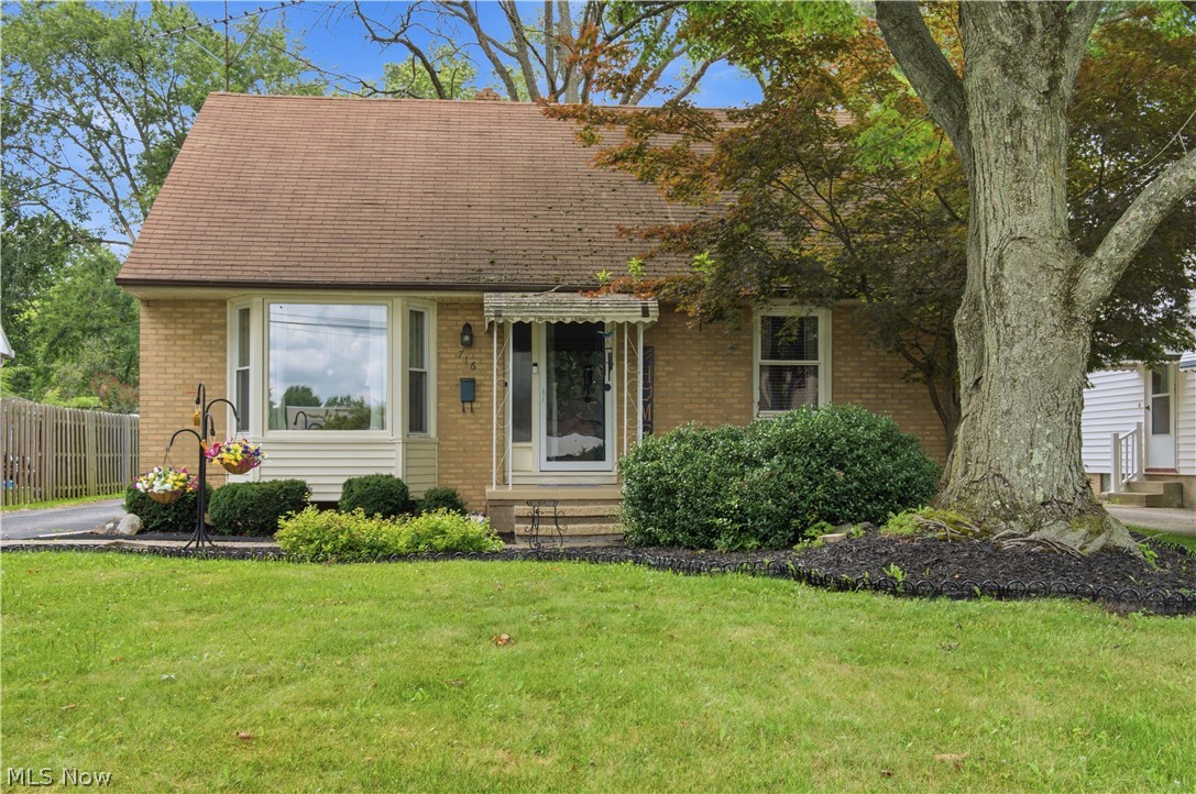 Welcome home to this charming and well-maintained 4-bedroom, 2-bath Cape Cod that offers the perfect blend of character, comfort, and modern updates. Step into the inviting living room featuring beautiful hardwood floors and a large picture window that fills the space with natural light. The spacious eat-in kitchen boasts newer flooring, a stylish backsplash, and all kitchen appliances stay, including the stove and microwave.  Relax in the bright 3-season sunroom overlooking the backyard, perfect for morning coffee or evening unwinding. The updated bathroom features a newer tub, The spacious primary bedroom provides a comfortable retreat, while the partially finished basement offers additional living, recreation, or storage space.  Enjoy hot summer days in comfort with central air!  Conveniently located near hospital, shopping, restaurants, and other everyday amenities, this move-in ready home is one you won’t want to miss!