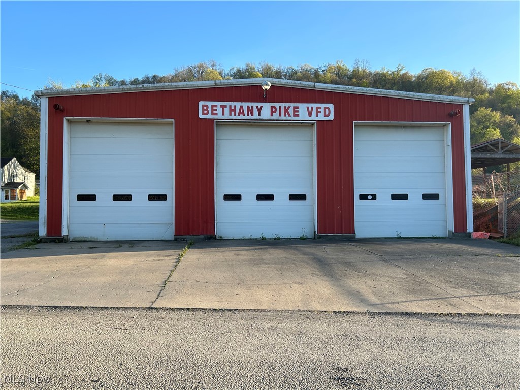 CALL TODAY to view this ONE OF A KIND investment property which includes a 3 bay fire house, shelter, playground, and acreage on 7 parcels.