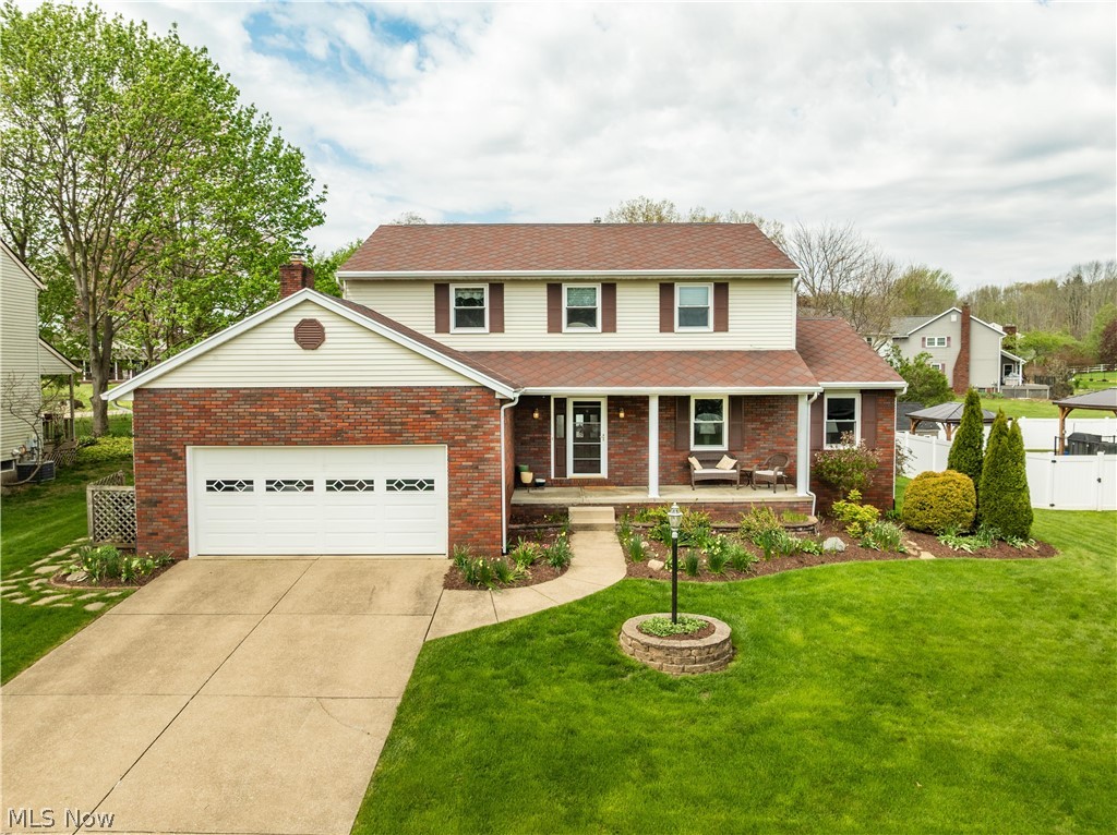 Wonderful opportunity in a highly convenient North Canton location, Lake Township - North Canton City School District! This beautifully maintained 4-bedroom, 2.5-bath home is truly move-in ready and showcases thoughtful updates and stylish décor throughout. A welcoming covered front porch leads to a gracious foyer with LVP flooring. The spacious living room and formal dining room feature engineered hardwood flooring, perfect for everyday living and entertaining. The remodeled eat-in kitchen offers Corian countertops, a sitting bar, pantry, under-cabinet lighting, and a semi-open layout to the cozy family room with gas fireplace and custom built-ins—an ideal gathering space. Sliding doors lead to a private backyard retreat complete with deck, pool, water feature, and partially fenced yard. Convenient first-floor laundry and a beautifully updated half bath are located just off the garage entry. Upstairs, you’ll find four generously sized bedrooms, including a stunning primary suite with a fully remodeled bath featuring a walk-in shower, beadboard ceiling, updated vanity, and skylight for abundant natural light. The additional bedrooms offer ample closet space and share a remodeled hall bath with LVP flooring, beadboard ceiling, and skylight. The dry, full basement provides excellent storage and future finishing potential. Major updates include: 50-year roof (2010), Trane HVAC, water conditioning system, pool liner & heater (2019), kitchen remodel (2020), new windows (2021), full bath remodels (2021), half bath remodel (2022), well tank (2022), carpet on steps, upstairs hallway & primary bedroom (2023), ceiling fans throughout, and updated appliances and kitchen flooring (2024). Move right in and start enjoying everything this exceptional home has to offer!