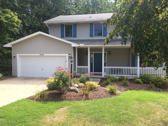 Beautifully maintained Schalmo built colonial on almost an acre of land sitting on a beautifully treed lot.  A large playset will remain.  
Beautiful hardwood floors.    The large kitchen has a spacious eating area with lots of room for a large table and a large walk in pantry.  What better place for a washer and dryer than the second floor where all of the dirty clothes are.  The front loader washer and dryer remain with the home.  So much convenience.  
The basement was professionally finished with wet bar for entertaining.  Move in condition and close to everything!!