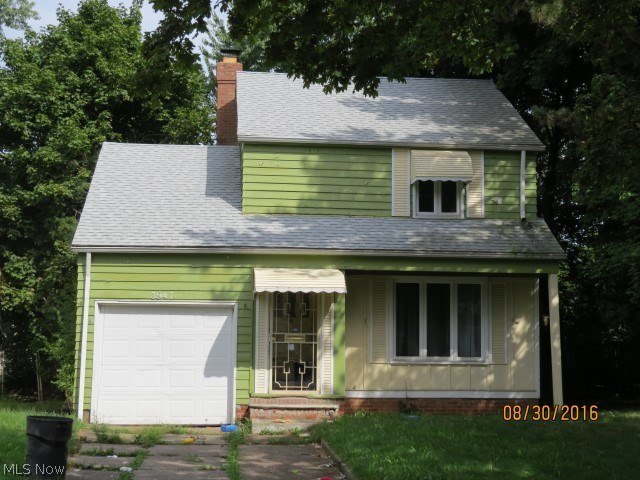 Charming Colonial with attached 1 car garage.  Nice treed lot, much potential.
