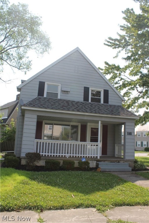 Clean, cute and ready for you! Lorain's east side on a redone street, corner lot with a nice inviting front porch. Low maintenance exterior with newer windows in like new shape, extra large side yard too. Plenty of room to add a custom garage. The interior pulls you in with neutral colors and new flooring on both floors. First floor has new easy care laminate flooring, steps and upstairs have brand new carpet. Recently installed ceiling fans and light fixtures are the icing on the cake! Very well maintained. Nov 2020 a clean out was installed in the yard at a cost of $3500. You may have either a gas or electric range and dryer as home is prepared for either. Home was reinsulated to make it cozy. The spacious first floor is waiting to entertain with the flow from the front porch, through living room and to the large dining room.