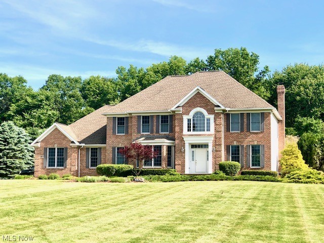 Fabulous colonial nestled on 2+ acres on cul-de-sac with wooded backdrop, presents over 3800 sq ft of living space.  Gracious two story foyer leads to  elegant formal dining room with wainscoting and bay window.  Inviting formal living room offers French doors to family room.  Engaging family room boasts brick fireplace flanked by built-ins, wall of windows, and opens to kitchen. Gourmet kitchen features maple cabinetry, granite counters, center island/breakfast bar, walk-in pantry, all appliances including double ovens and gas cooktop, and planning station.  First floor laundry, separate mudroom, and guest bath are conveniently located.  Luxurious master suite highlights an intimate lounge/sitting room area and glamour bath with soaking tub, separate shower, and WIC. Three additional generous sized bedrooms, main full bath, and loft area complete the second floor.  The finished lower level offers recreation room, office/multi-purpose room, and full bath. 14 course basement with ample