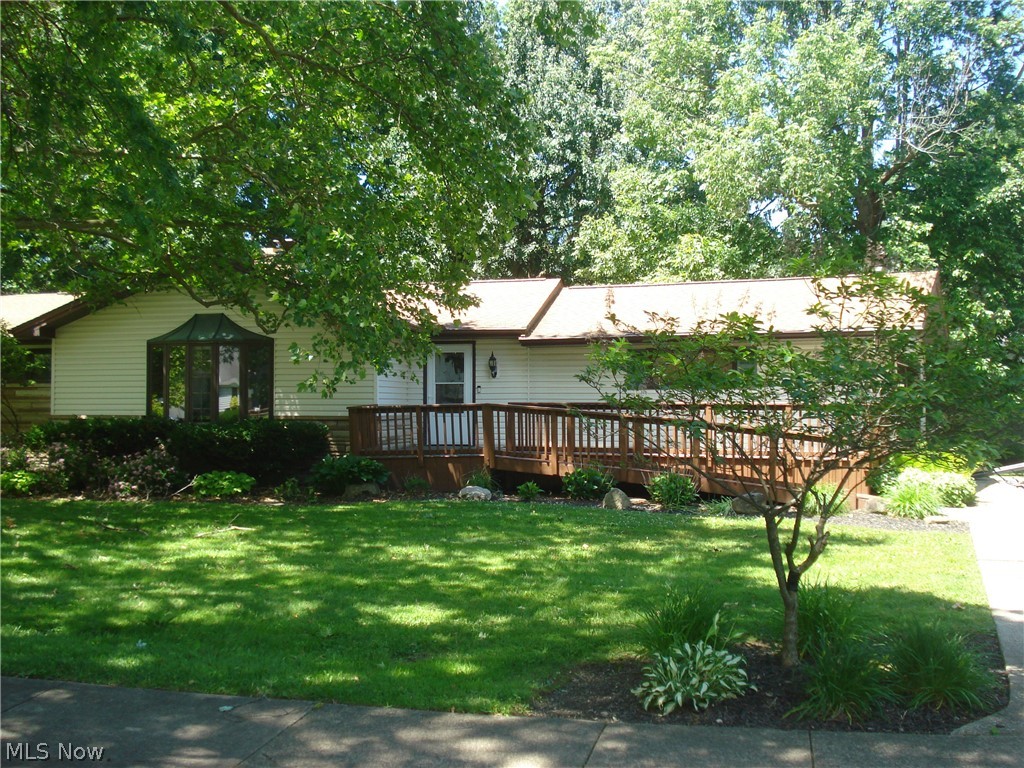 A great opportunity awaits, This ranch home offers convenience with 4 bedrooms 2 full baths and 2 half baths located near shopping, schools, parks, restaurants and easy access to highways. This sprawling ranch has a spacious living room with hardwood floors, a bow window and a gas fireplace. The interior does need some cosmetic improvements, but you cannot beat the location. The roof is approximately 10/12 years and the Pella windows around 12/14 yrs old. The kitchen offers  plenty of space for dinning with a sky light and a conveniently located half bath. The hardwood floors continue through the hallway and 3 bedrooms. The master bedroom has his and hers closet and a ceiling fan. As we continue down the hallway which takes us to the 4th bedroom that's wheel chair accessible with a (19x14) full wheel chair accessible bathroom. With a private sliding glass door entrance to the back yard as well. We also have an attached 3 season room (21x11) on the back of the house with access to the private tree filed back yard and a (14x14) patio area. The full unfinished basement provides a blank canvas to create additional living space with a open area of (22x22) , a laundry area, a half bath with a shower and two additional rooms, (18x8) and (22x9) you can use for storage. We have a 2 car attached garage with a double wide driveway, which the driveway is located on Elm street. The well cared for landscaping provides .51 acres of space with a Trex deck (21x11) in the front yard is perfect for relaxing. There are 2 separate thermostats one for the main living area and one for the additional bedroom and bathroom. This is a estate sale, property being sold as is condition.