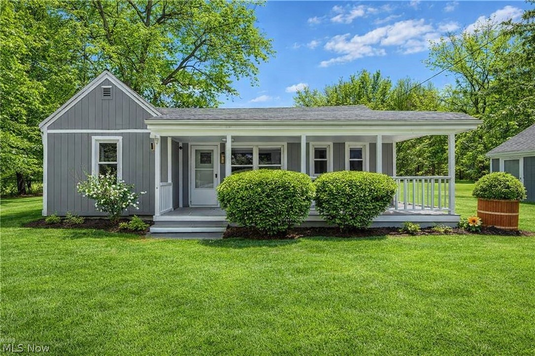 Move right in to this beautifully completely remodeled home set on nearly an acre in the heart of Chesterland! This turnkey property has been thoughtfully updated from top to bottom and is truly ready for immediate occupancy.

Step inside to discover a brand-new kitchen featuring all-new cabinetry, quartz countertops, and a spacious layout with a comfortable eating area that opens seamlessly to the living room—perfect for everyday living and entertaining alike. The entire home showcases brand-new luxury vinyl plank (LVT) flooring and has been freshly painted throughout, offering a clean, modern feel.

The home includes two bedrooms and a highly functional first-floor laundry room complete with an abundance of shelving and storage. Outside, enjoy the charm of a welcoming front porch, plus a backyard pergola ideal for relaxing or hosting guests. A detached garage adds convenience and additional storage. Don’t miss this opportunity to own a beautifully updated home with space, style, and comfort—schedule your showing today!