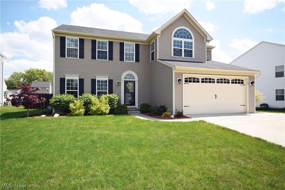 Beautiful updated 2-story with over 2500 sq ft plus finished basement. Large open floor plan with 9 foot ceilings throughout the 1st floor. 4 bedrooms, 3.5 baths, 1st floor laundry, open remodeled kitchen with all new appliances and attractive white concrete counter-tops. Kitchen is open to the great room and sunroom to the back which provides tons of natural light and great views of the backyard.  All 4 bedrooms are on the second floor. Large master suite with vaulted ceilings, sitting area, large walk-in closet and updated private bathroom. Finished basement is great for recreation, parties, and just hanging out!  Backyard is fenced-in, has a concrete patio, and creates comfortable outdoor living.  2-car garage with extra bump out for storage or workshop space and extra wide concrete parking space in the driveway.  This place is gorgeous and has been infused with everything Pinterest!  Don't wait until it's sold! Call and schedule your showing today!