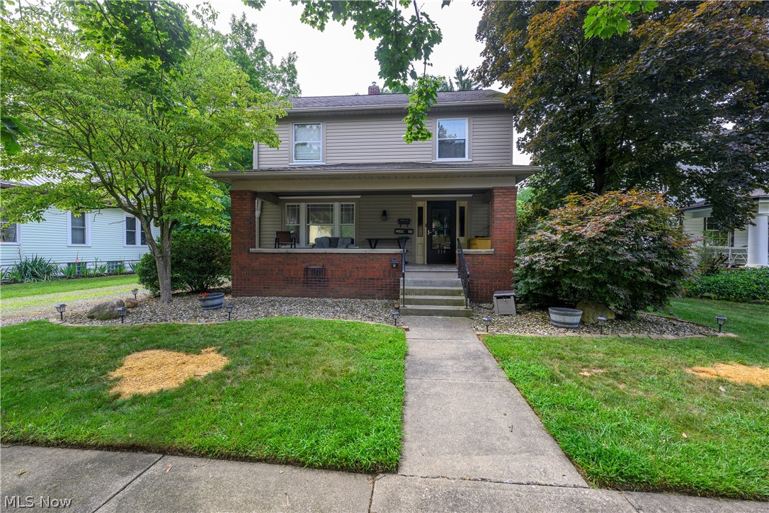 Welcome to a beautiful blend of timeless charm and modern convenience, designed to offer both space and comfort for everyday living. This warm and inviting 3 bedroom, 2.5 bathroom home instantly embraces you with its rich, original woodwork and classic details that flow beautifully through the main living spaces, creating an undeniable sense of home. The main level features two distinct living areas, providing incredible flexibility for your lifestyle. A comfortable, traditional living room offers the perfect setting for quiet conversation or a formal sitting area. Beyond that, a wonderful rear addition expands the home's footprint into an extra family room. This exceptional space centers around a cozy fireplace and is lined with ample built-in storage space, making it the ultimate hub for movie nights, hobbies, or hosting larger gatherings. The formal dining room making holiday dinners enjoyable. Just off the living spaces, the kitchen boasts modern updates, including a stainless appliances installed in 2023 that will stay with the home. The comfort extends outdoors to a large yard that offers endless possibilities for gardening, play, or relaxing in the fresh air. Parking and exterior storage are a breeze with the combination of a spacious two-car garage and an attached carport. A breezeway allows for relaxation in the hot tub. This property seamlessly pairs essential modern updates with endless character, offering a truly worry-free, turnkey lifestyle. Major mechanical upgrades bring total peace of mind, including a brand-new furnace and central AC system installed in 2025, alongside a new hot water tank from 2023. Call for a showing today before this one is sold!
