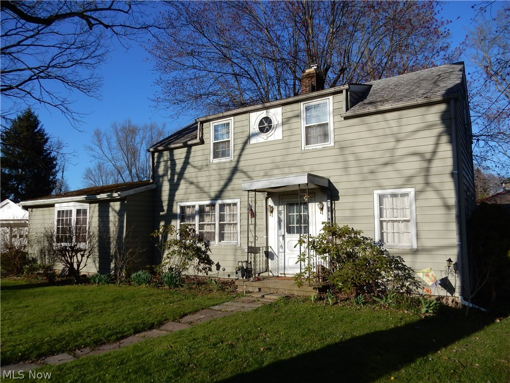 Own a part of Beach City History in this solid built cape. This property offers an over-sized double lot with tons of potential. Inside, you will find that the living space flows very nicely and has an abundance of possibility. The large living room has a very nice brick fireplace. Off the living room, there is a huge main floor master bedroom, showcasing 2 large closets and leads to the large master bath. You will appreciate having the laundry room located conveniently on the main floor. Up stairs, there are 2 sizable bedrooms and a full bath. The  This charming home is priced to sell. The electric, furnace and water heater are updated. Contact me for your private showing.