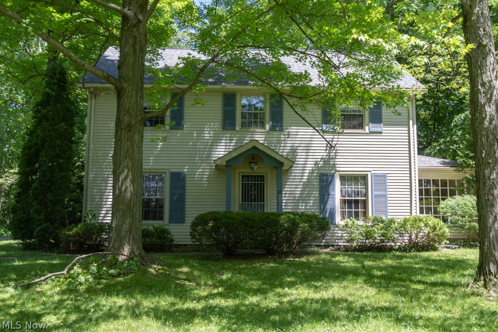 Stately 4 bedroom Boardman colonial situated in a beautiful parklike setting. The front door leads in to a center hall flanked by the formal dining room and oversized living room with fireplace and side sunroom. The eat-in kitchen has ceramic floors and a large picture window in the eating area. First floor 1/2 bath and access to 2 car attached garage. Hardwood floors, fresh paint and crown moldings run throughout the home. The second floor features 4 large bedrooms, full bath and plenty of closet space. Full basement. Beautiful yard is wooded and private with a brick back patio, side porch, 2 sheds and room to play. Home warranty included for worry free purchase! Call today!