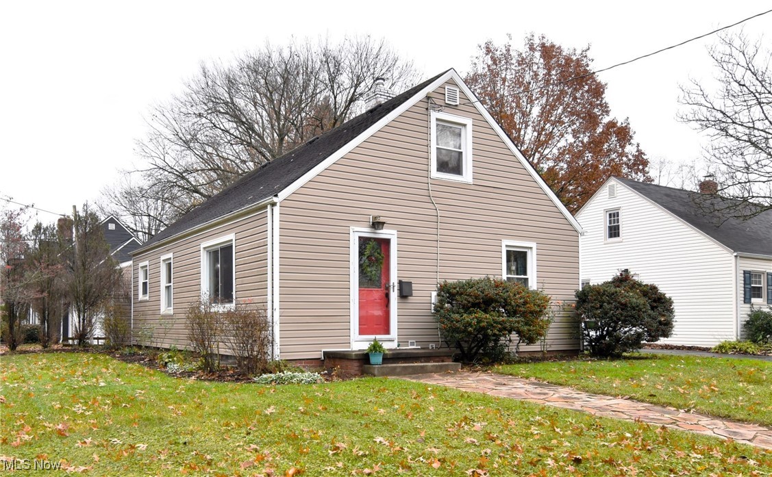 Charming Cape Cod in Desirable West Akron. Nestled in the picturesque West Akron neighborhood, this delightful Cape Cod-style home offers a perfect blend of comfort and versatility. Step into the spacious living and dining area, where hardwood floors create a warm and inviting atmosphere. The first floor features two bedrooms that share a full bath, offering convenience and accessibility. Upstairs, a large bonus room with built-in storage awaits, ready to be transformed into your dream master suite, a home office, or a playful retreat. The basement provides additional storage space and includes a washer and dryer for your convenience. Outdoors, an oversized two-car garage opens to a versatile concrete patio, perfect for entertaining. Ideally located near major highways, shopping, Portage Country Club, and the historic Stan Hywet Hall & Gardens, this home is a must-see! Don't miss your chance to enjoy the best of West Akron living.