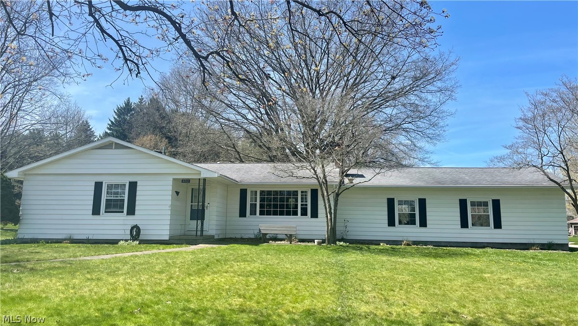 This home is a MUST SEE! Situated on a corner lot, this 3-bedroom ranch is nestled in a cozy Kent neighborhood with mature trees, sidewalks and close proximity to everything that Kent has to offer. With complete first floor living, the floorplan is ideal for entertaining and easy living. The kitchen has updated cabinets and flooring, along with stainless steel appliances and an abundance of storage. The dining room flows to the large living room and leads directly out to the 3-seasons room, which overlooks the private backyard and patios. The living room is centered by a large picture window and a gas fireplace. All three bedrooms are on the main floor, which are oversized and have large closets with organization systems. The primary bedroom is down the hall from the main living areas and boasts a large closet and full bathroom! The additional full bathroom on the first floor is extra large for guests and convenient to the bedrooms and living area. The lower level is ready to be finished and is the same footprint as the main level. The 3-car garage is a huge bonus- with tons of storage and offers an additional place for parties and entertaining. The corner lot offers a large amount of privacy and has two separate patios for fires, relaxation and entertaining. Call TODAY for your private showing.