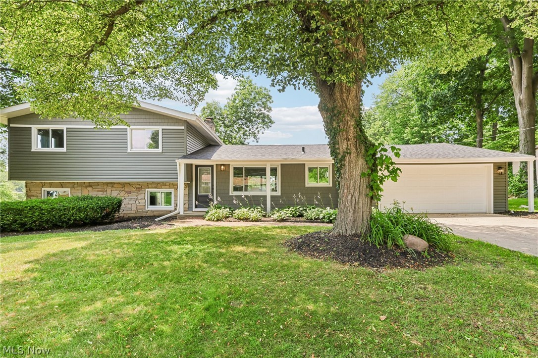 Modern Luxury Meets Nature in Fairlawn

Welcome to this fully renovated 5-bedroom, 5-bathroom (3 full, 2 half) split-level home offering approximately 3,600 square feet of updated living space. Backing directly to the Fairlawn Preserve and Nature Walk, this home combines modern finishes with a peaceful setting.

The open floor plan features a gourmet kitchen with quartz countertops, custom cabinetry, high-end stainless steel appliances, refinished hardwood floors, waterproof LVP flooring, and two fireplaces. The spacious first-floor primary suite includes a walk-in closet, private laundry, soaking tub, double vanity, and custom glass shower.

Major updates include the roof, siding, HVAC systems, tankless water heater, plumbing, electrical, lighting, rear deck, and more.

A major advantage of this property is the seller's commitment to transparency. A professional home inspection has already been completed and is available for buyers to review upfront, potentially saving time, money, and unexpected surprises. The sellers have also completed inspections commonly required for VA financing, helping make the buying process smoother for VA buyers.

Located in the highly rated Copley-Fairlawn School District and just minutes from Montrose shopping and dining.

Contact our office today to schedule your private showing or submit your offer!