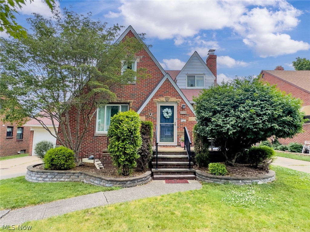 Meticulously Maintained Brick Cape Cod In The Heart Of Parma… Offering 4 Bedrooms, 2.5 Baths, And An Attached 2-Car Garage, This Home Combines Timeless Charm With Exceptional Space And Versatility… The Main Level Features Hardwood Floors, Two Spacious Bedrooms, A Full Bath, A Welcoming Living Room With A Wood-Burning Fireplace, Formal Dining Room, And A Large Eat-In Kitchen With Abundant Cabinet And Counter Space… An Enclosed Sunroom Overlooks The Beautifully Landscaped Backyard And Provides The Perfect Place To Relax…Upstairs You’ll Find Two Additional Generously Sized Bedrooms, A Half Bath, And Flex Bonus Space Ideal For A Home Office, Sitting Area, Or Playroom… The Expansive Finished Lower Level Adds Even More Living Space With A Large Rec Room Featuring A Second Wood-Burning Fireplace, Full Bath, Second Kitchen, And Abundant Storage… Storage Is Plentiful Throughout With Numerous Closets, Attic Storage, And Additional Basement Storage Areas...Situated On A Beautiful Fully Fenced Lot With Mature Landscaping, A Welcoming Front Porch, Spacious Rear Deck, And Inviting Curb Appeal, This Lovingly Cared For Home Showcases Pride Of Ownership Throughout... Conveniently Located Near Shopping and Directly Across From Ridgewood Golf Course...Truly A Special Place To Call Home.