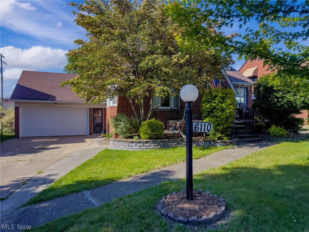 Meticulously Maintained Brick Cape Cod In The Heart Of Parma… Offering 4 Bedrooms, 2.5 Baths, And An Attached 2-Car Garage, This Home Combines Timeless Charm With Exceptional Space And Versatility… The Main Level Features Hardwood Floors, Two Spacious Bedrooms, A Full Bath, A Welcoming Living Room With A Wood-Burning Fireplace, Formal Dining Room, And A Large Eat-In Kitchen With Abundant Cabinet And Counter Space… An Enclosed Sunroom Overlooks The Beautifully Landscaped Backyard And Provides The Perfect Place To Relax…Upstairs You’ll Find Two Additional Generously Sized Bedrooms, A Half Bath, And Flex Bonus Space Ideal For A Home Office, Sitting Area, Or Playroom… The Expansive Finished Lower Level Adds Even More Living Space With A Large Rec Room Featuring A Second Wood-Burning Fireplace, Full Bath, Second Kitchen, And Abundant Storage… Storage Is Plentiful Throughout With Numerous Closets, Attic Storage, And Additional Basement Storage Areas...Situated On A Beautiful Fully Fenced Lot With Mature Landscaping, A Welcoming Front Porch, Spacious Rear Deck, And Inviting Curb Appeal, This Lovingly Cared For Home Showcases Pride Of Ownership Throughout... Conveniently Located Near Shopping and Directly Across From Ridgewood Golf Course...Truly A Special Place To Call Home.